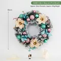 40cm Christmas wreath with snow effect, champagne flowers, and teal ornaments - Blue Pink Wreath 40cm