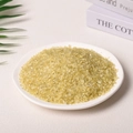Natural yellow quartz crystal stones displayed in a white dish for aromatherapy - 100g Of Colored Citrine (3-5mm)