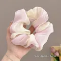 Detailansicht eines rosa-weißen Organza-Haargummis mit 12 cm Größenangabe für Frisuren - Rosa Verlauf