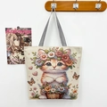 Off-white canvas tote bag featuring a floral cat embroidery with striped straps - Flower Gold Thread Single Sided Little Kitten