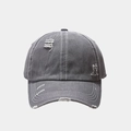 Close-up of distressed dark grey washed baseball cap with white contrast stitching and torn detail - Adjustable / Gray