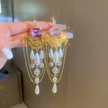 Dettaglio orecchini nappa dorata con cristalli viola e ciondoli di perle - Stile Cristallo Viola Oro (34#)