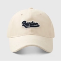 Close-up of deep blue Barton 1768 embroidery on a beige cotton twill baseball cap - Off White