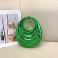 Elegant green acrylic handbag with textured ripple design and glossy golden handle - Green