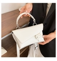 Minimalist white crossbody waist bag with asymmetrical flap and silver buckle detail - White