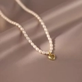 Natural freshwater pearl bracelet with a golden heart pendant on champagne silk fabric - Heart Seed Bead Shell Pearl Necklace