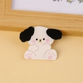 Cute acrylic cartoon puppy brooch with long black ears on a warm yellow background - Cartoon Dog