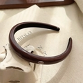 Elegant brown PU leather headband with oval WINGS metal logo accent for women - Oval Lace Gold Tag