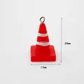 Detail shot of mini traffic cone charm with 30mm height and 17mm width dimensions - Traffic Cone