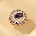 Macro view of flower-shaped ring with large oval purple stone and zircon petals - XZ12 Purple Petal Flower