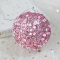 Detail showing a pink glitter Christmas ball with crystal accents on a plush background - Diamond Glitter Pink Foam Ball