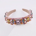 Detailed macro view of colorful rhinestones and pink gems on a velvet baroque headband - I Pink Multicolor