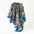 Detailed shot of satin scarf featuring colorful cartoon cat prints and blue polka dot edges - 90x90cm / Blue