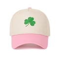 Close-up of green clover embroidery on beige and pink cotton twill baseball cap - Beige Crown + Pink Brim