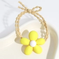 Detail of yellow flower hair tie with wavy elastic band on minimalist tray - Flower / Yellow
