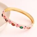 Chic pink enamel open bangle with colorful zircon stones in gold-plated copper finish - Pink
