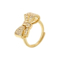 Minimalist gold bow ring with sparkling zircon stones and adjustable open band design - Pavé Zirconia Bowknot Ring / Gold