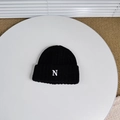 Close-up of black double-layered knit beanie featuring white embroidered letter N - Approx. 3-8 Years / Black