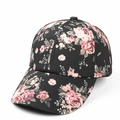 Detailed close-up of floral print patterns on the black canvas baseball cap fabric - Adjustable / Black