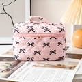 Pink quilted bow cosmetic bag with large capacity handle and zip closure for travel - Large / Pink With Black Bow (Large)