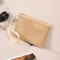 Beige hollow straw beach wristlet bag with zipper and golden hook on white fabric - Beige