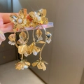 Detailed view of long gold floral tassel earrings with pearls and crystal accents - Flower Pearl Tassel (13#)