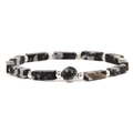 Macro detail of natural stone rectangle beads stretch bracelet with silver spacers - Black Spots