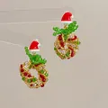 Detail of handmade beaded Christmas wreath earring with red hat and colorful crystals - Christmas Wreath Hat-Silver Pin / Stud Earrings