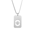Macro shot of silver titanium steel necklace featuring a hollowed letter C pendant - Letter O
