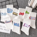 Nine pairs of white crew sports socks featuring colorful street graffiti alphabet patterns - Unisex (35-44) / 9 Series Selectable
