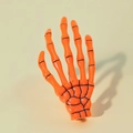 Leuchtend oranger Skeletthand-Haarclip mit schwarzen Gelenklinien für Halloween-Partys - Orange