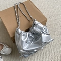 Silver metallic pleated shoulder bag with chic bow details and a stylish chain strap - Silver