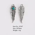 Ethnic feather pendant with turquoise inlay in antique silver finish for jewelry making - Feather