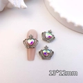 Macro detail of crown heart nail art charm with colorful rhinestones on silver base - Silver-AB