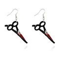 Close-up of Halloween scissors acrylic earrings with realistic red blood splatter effect - Scissors