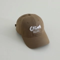 Close-up of brown cotton baseball cap with white CHINA 3D embroidery and curved brim - 52-54cm (3-8 Years) / Dark Khaki