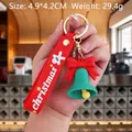 Green Christmas bell keychain with red bow and silicone wrist strap for bags - Christmas Bell-1