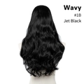 Detail view of wavy jet black synthetic hair extensions in color #1B from back profile - 24 inch / Jet Black (#1B)