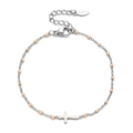 Minimalist stainless steel bracelet with cross pendant and beige beads in circular layout - Nude