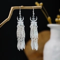 Vintage silver Bohemian tassel earrings with hollow floral pattern and rhombus metal charms - Hollow Pattern Metal Sheet Tassel Style (E5750-11)