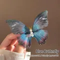 Macro shot of 9cm blue gradient tulle butterfly clip with four white pearls on 3cm base - With Hair Clip / Blue
