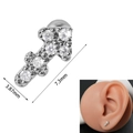 Silver arrow stud earring with white zircon inlay on a silicone ear model display - 0.8*6*3mm / Sagittarius