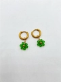 Handmade gold hoop earrings with green crystal flower pendants for a floral look - Transparent Green