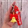 Christmas bell keychain with yellow metal bell, red bow, and silicone wrist strap - Christmas Bell-2