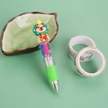 Mini Christmas 4-color ballpoint pen with green cartoon capybara topper and soft grip - Christmas Capybara-Tree