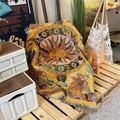 Detail of bohemian sun pattern woven blanket with decorative fringes in camping setting - XT426-1 Sun Face