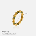 Macro detail of a golden bamboo-style stainless steel ring with colorful gemstones - Bamboo Colorful Zirconia Ring