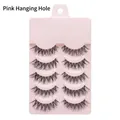 Detail of 5 pairs natural manga false eyelashes on a pink display board with hanging hole - Handmade A20 Pink Hanging Hole (5 Pairs)