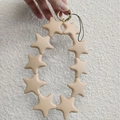 Beige silicone star-shaped wristlet keychain with gold metal ring for phone accessories - Oatmeal Yellow (10 Stars)