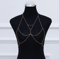 Exaggerated gold body chain featuring multilayer beaded fringe on a black mannequin - ZW2749 Body Chain Gold